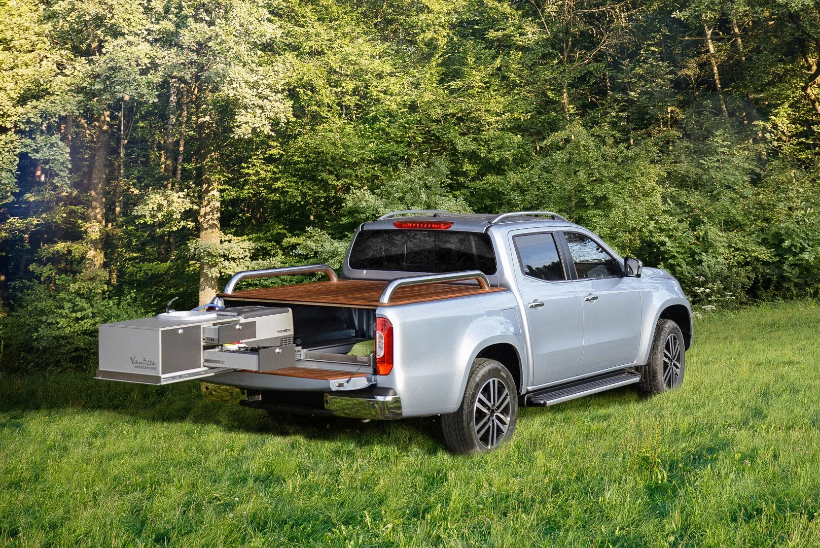 A lighter, simpler X-Class camper, this one features a slide-out kitchen set-up from VanEssa - just add a roof-top tent and you have a multi-day camping truck