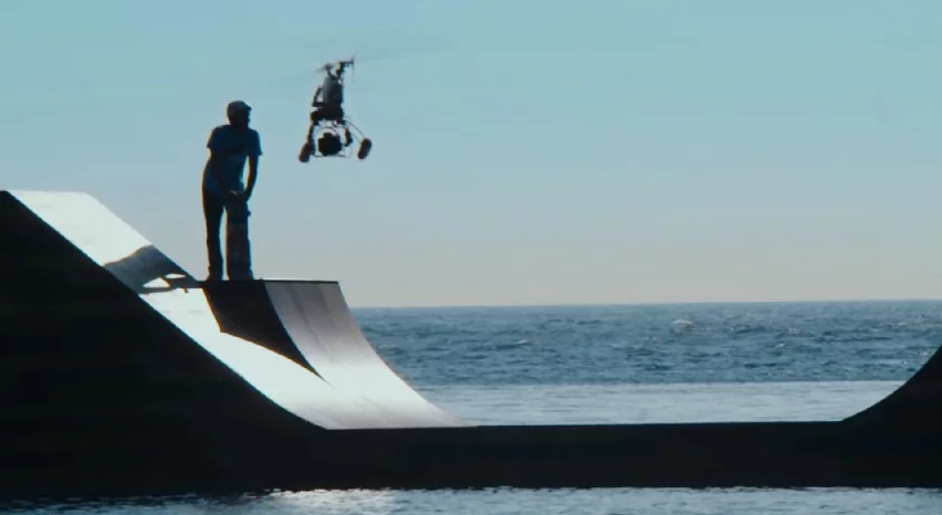 A flying drone films the action