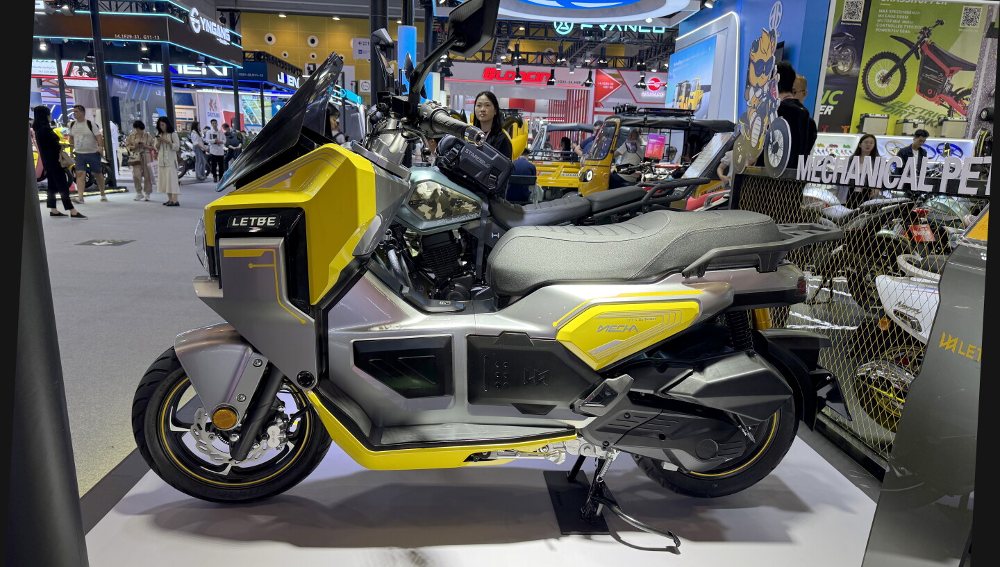 LetBe is one of the many motorcycle manufacturers in Guangzhou, and it refers to its models as mechanical pets, foreseeing a time where we become much closer to our motorcycles as they become become Artificial Intelligence enabled. This is "Mecha" a concept touring scooter bound for production in the near future ... when energy density in batteries matures and with appropriate voice communication, your motorcycle might also become your BFF or an adventure conspirator, not to mention a companion smart enough to call in the cavalry if you end up in a box hedge.