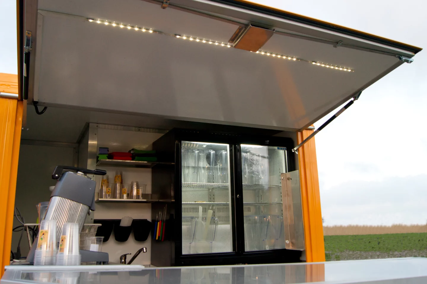 The Vendo's lead-acid battery is able to keep the onboard refrigerator running while the vehicle is in transit