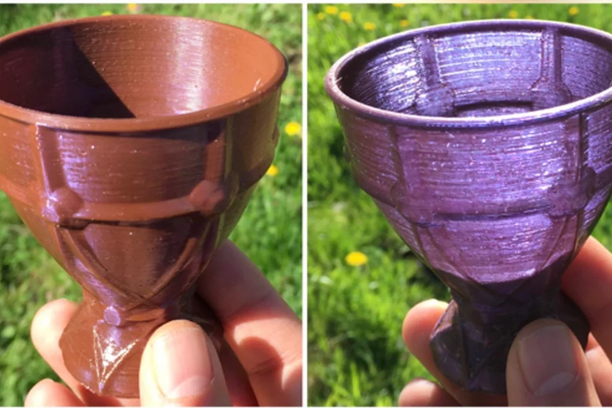 A miniature goblet printed from the new material appears both opaque brown and translucent violet