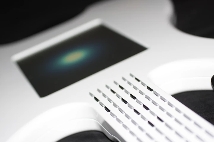 Each 'keycap' represents a note, similar to fret positions on a traditional guitar but the sound of each one can be varied according to user preference
