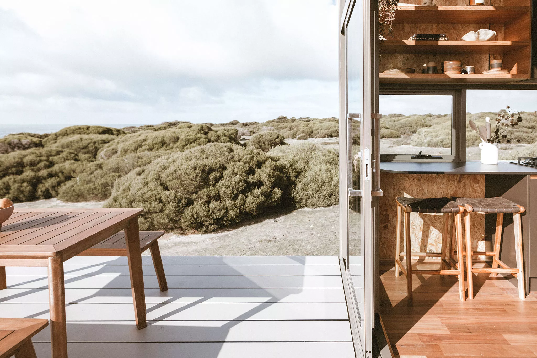 The Maldhi's kitchen area includes a small breakfast bar for two