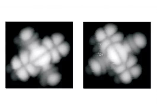 Actual scanning tunneling microscopy images of the naphthalocyanine molecule in the "on" and the "off" state. These images illustrate the stability and exact symmetry of the electrical behavior of the molecule between "on" and "off".