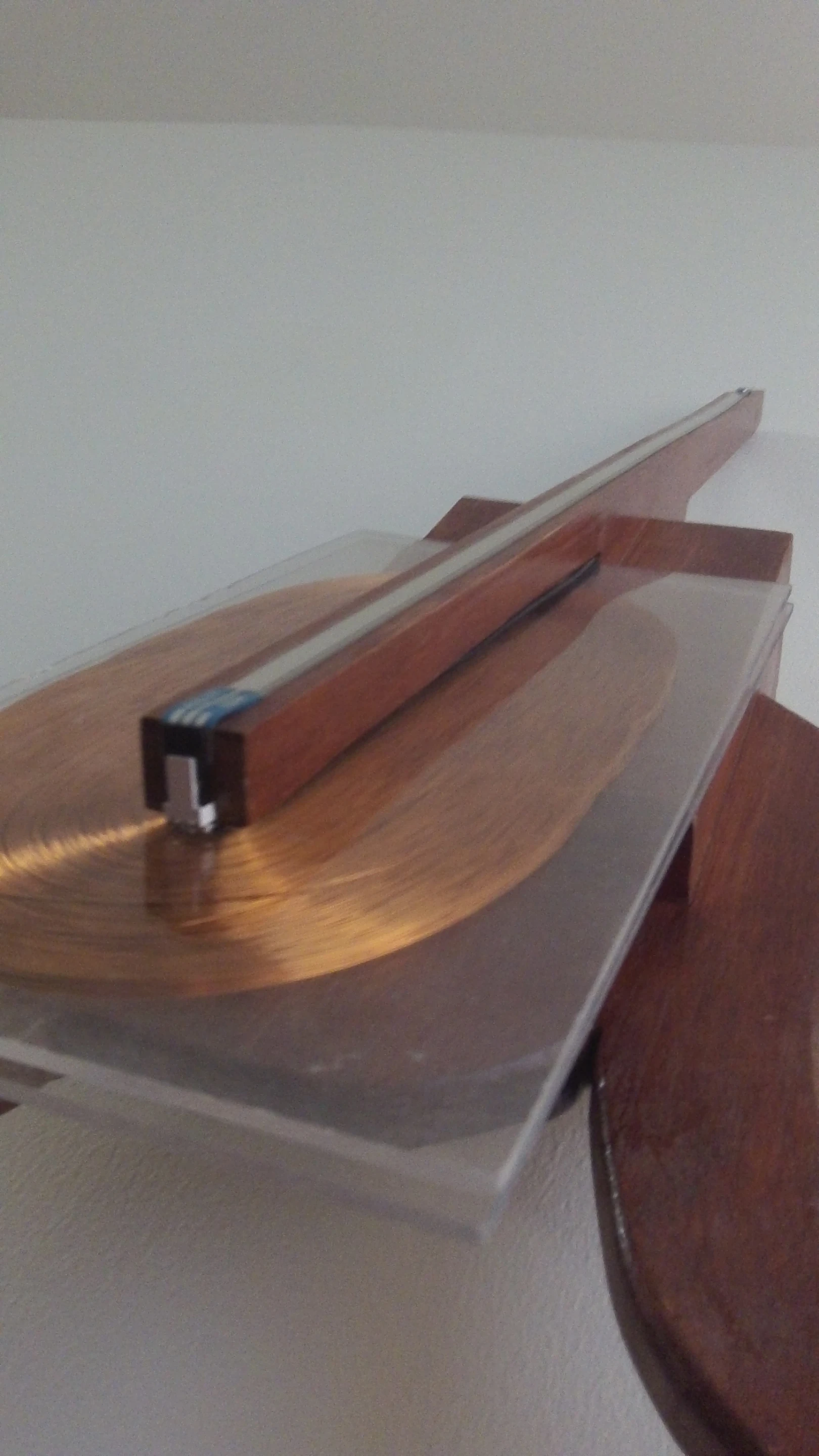 The bow switches select a tuning for the instrument, and pressing down on the resistive ribbon in different places along its length changes its output voltage