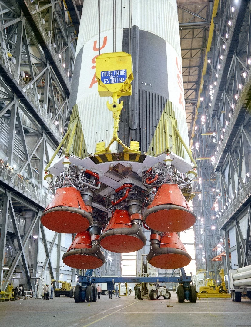The S-IC stage being erected for the final assembly of the Saturn V launch vehicle for the Apollo 8 mission