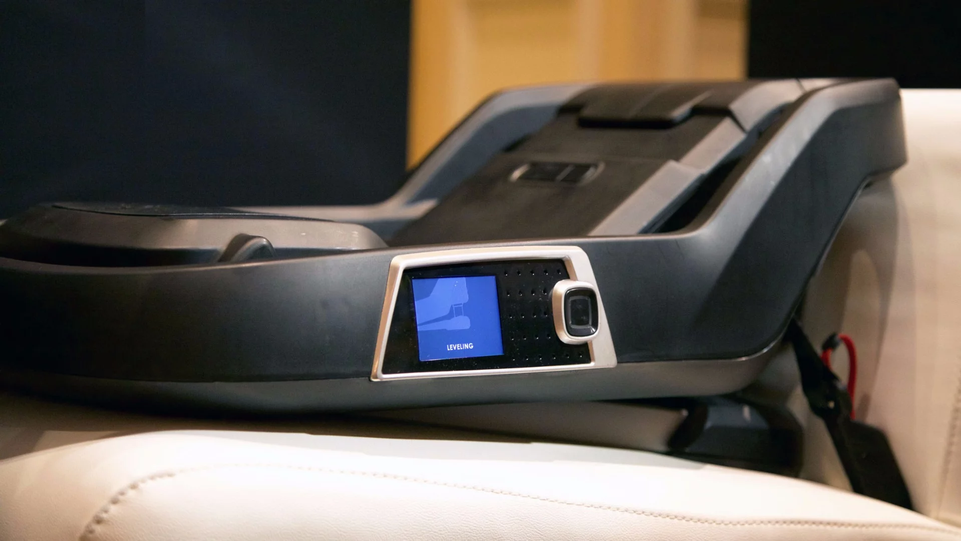 The installation process begins with the seat’s base being installed in the car