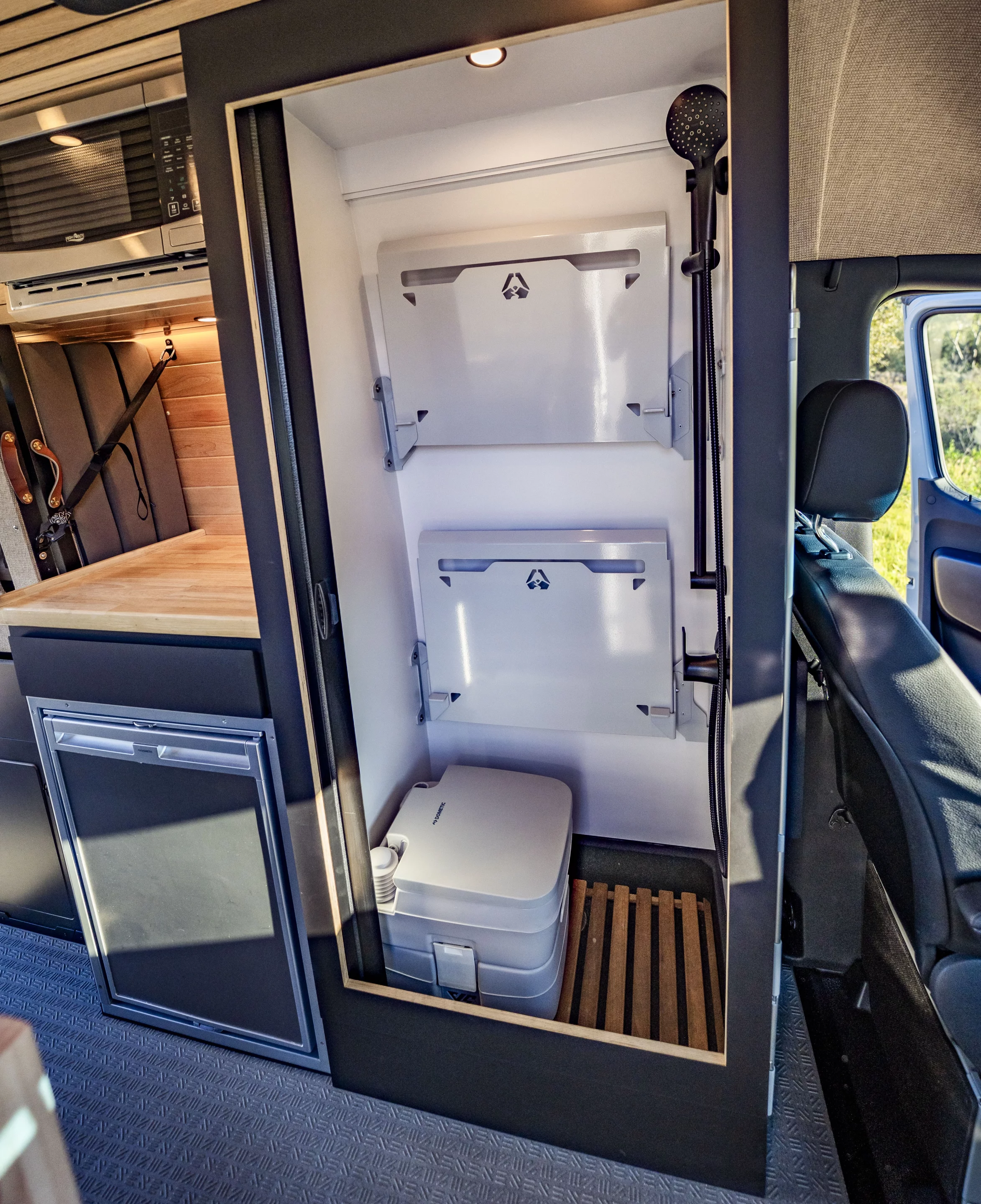 The Album's front wet bath includes a removable cassette toilet, shower and folding shelves