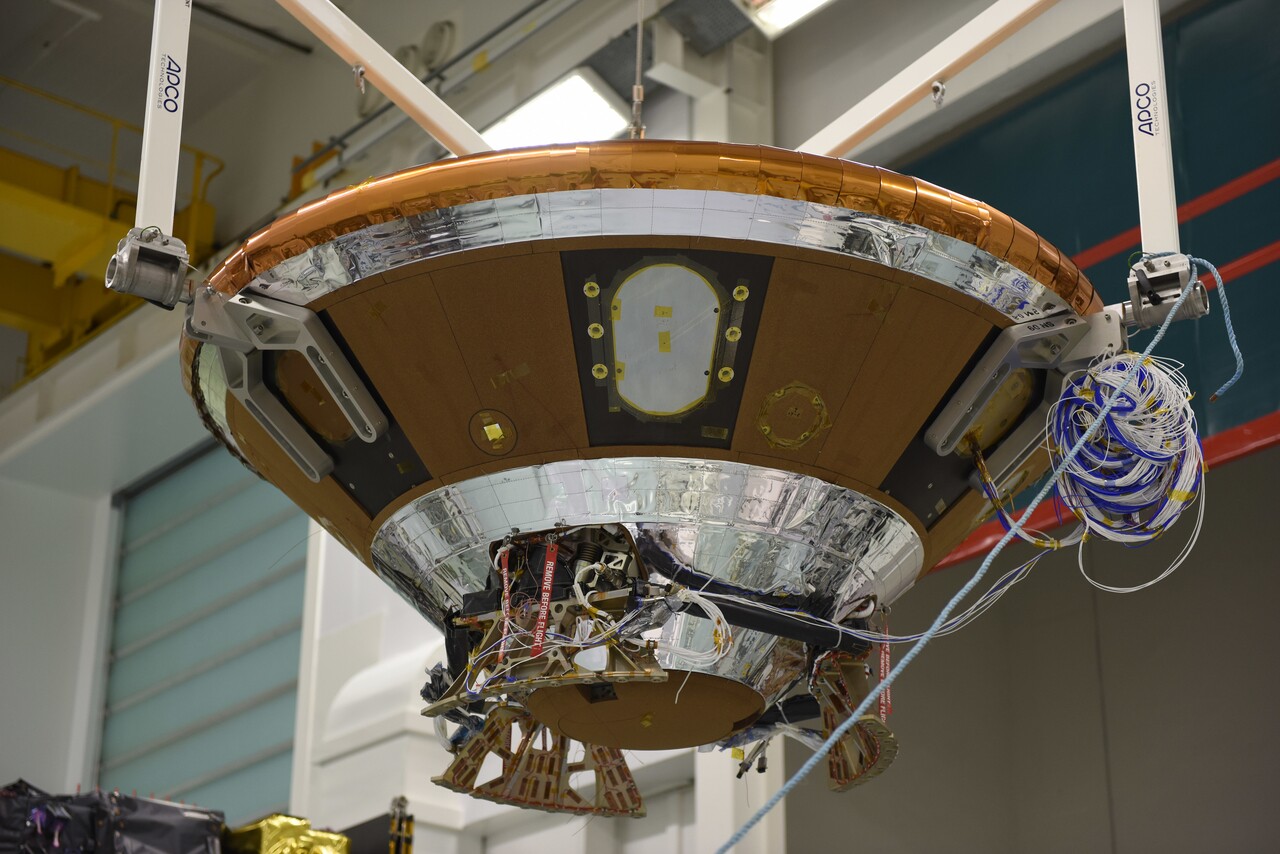 Schiaparelli, also known as the ExoMars Entry, descent and landing Demonstrator Module, being installed at the top of the Trace Gas Orbiter