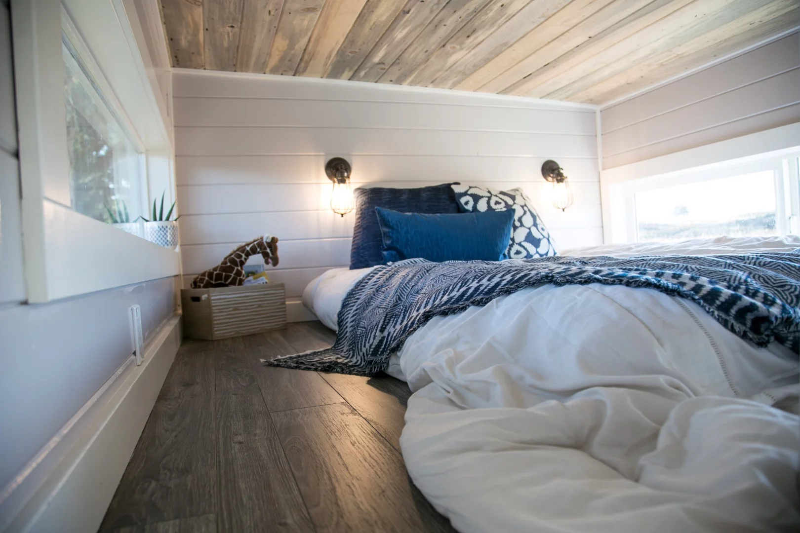 The Kentucky Donut Shop's bedrooms are the typical tiny house style and feature low ceilings