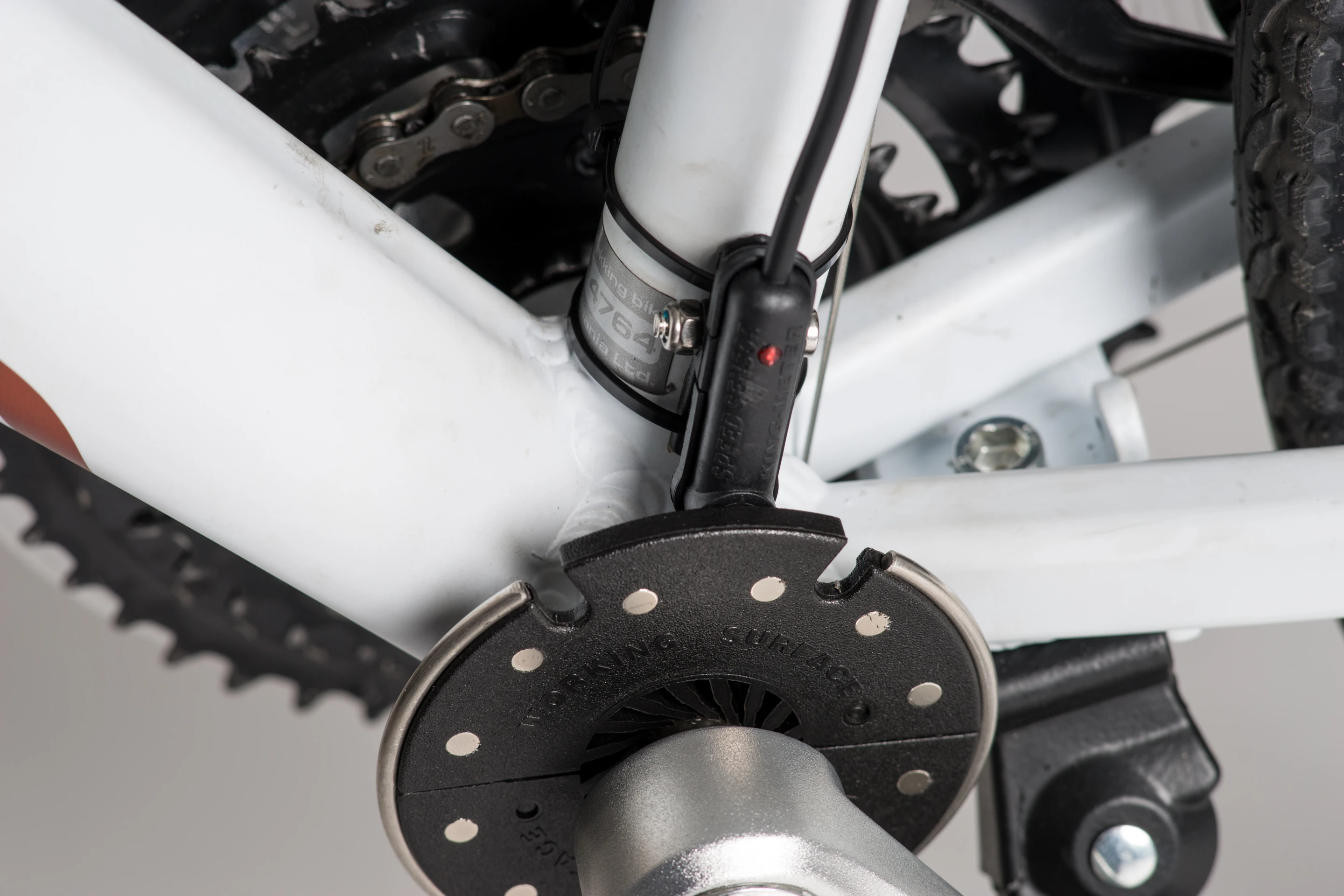 A permanently-installed Pedal Assist Sensor monitors how fast the rider is pedaling