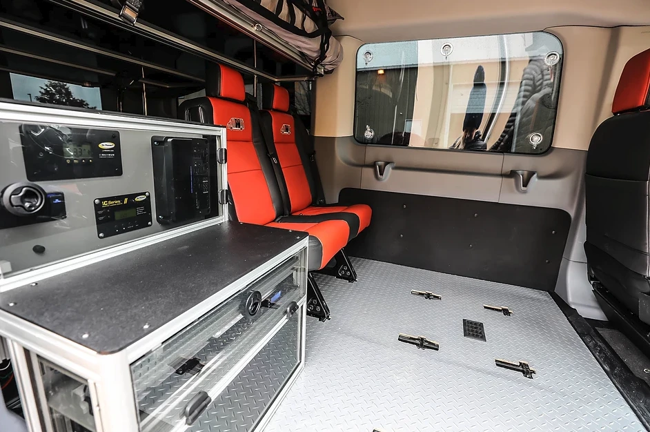 Take the middle row of seats out and you have a place to mount the kitchen block