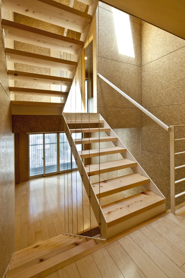 A wooden stairway runs up the center of the house (Photo: Stirling Elmendorf)
