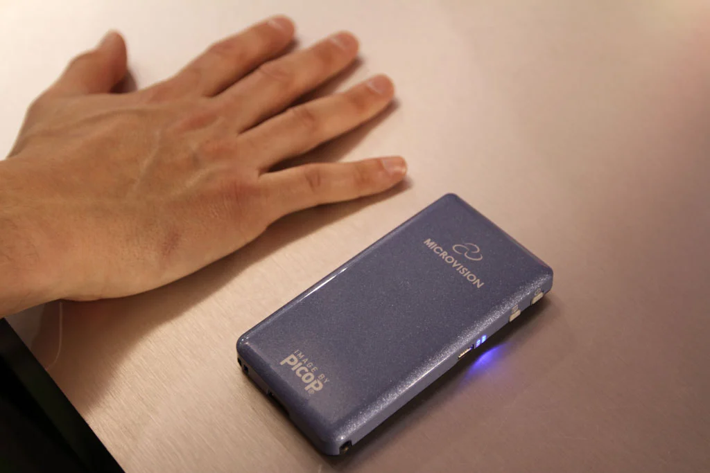 The Microvision SHOWWX laser pico projector enables widescreen quality display of images directly from a mobile device