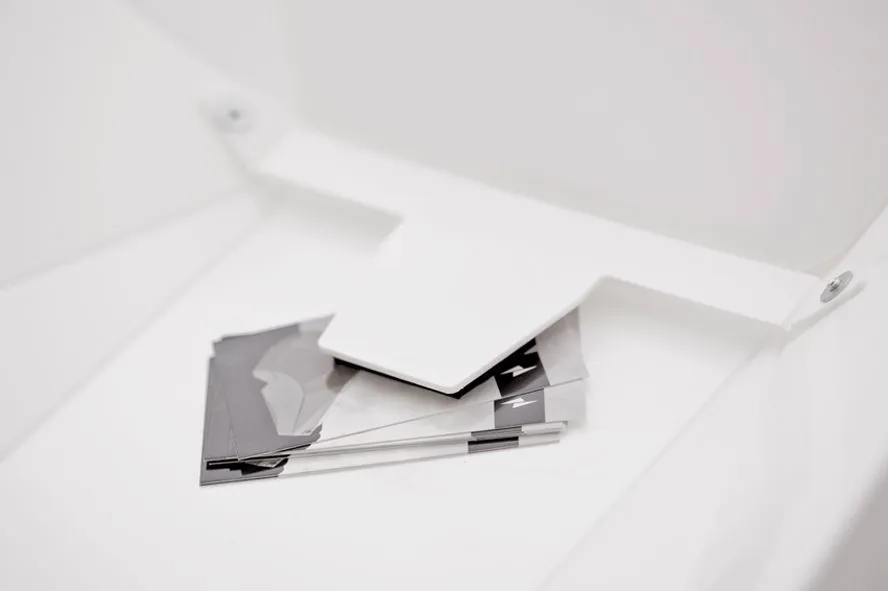 Solid Gray features a foam-padded multi clip located inside to keep important documents safe