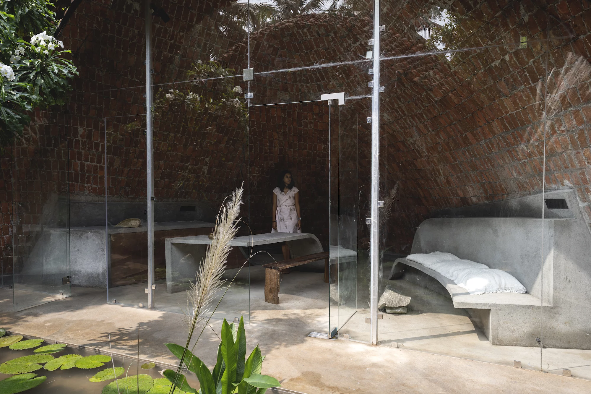 The Wendy House's furniture is made up of exposed concrete, which is softened by some wood and detailing