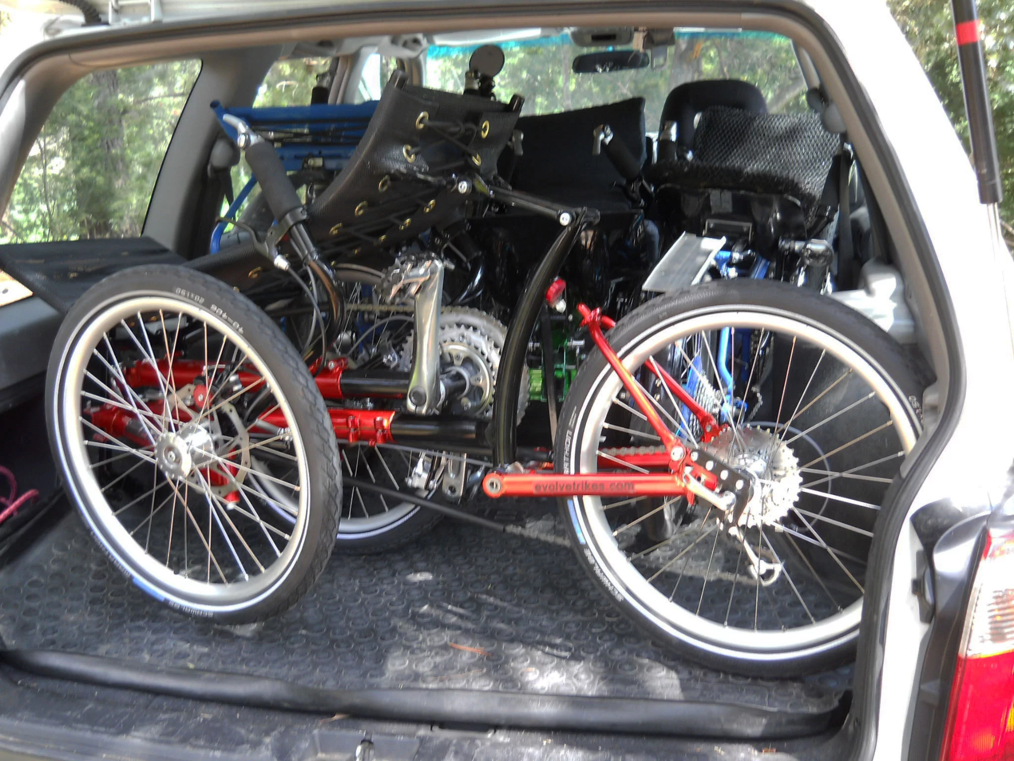 Four Evolve folding recumbent trikes can fit in the back of a Subaru Forester