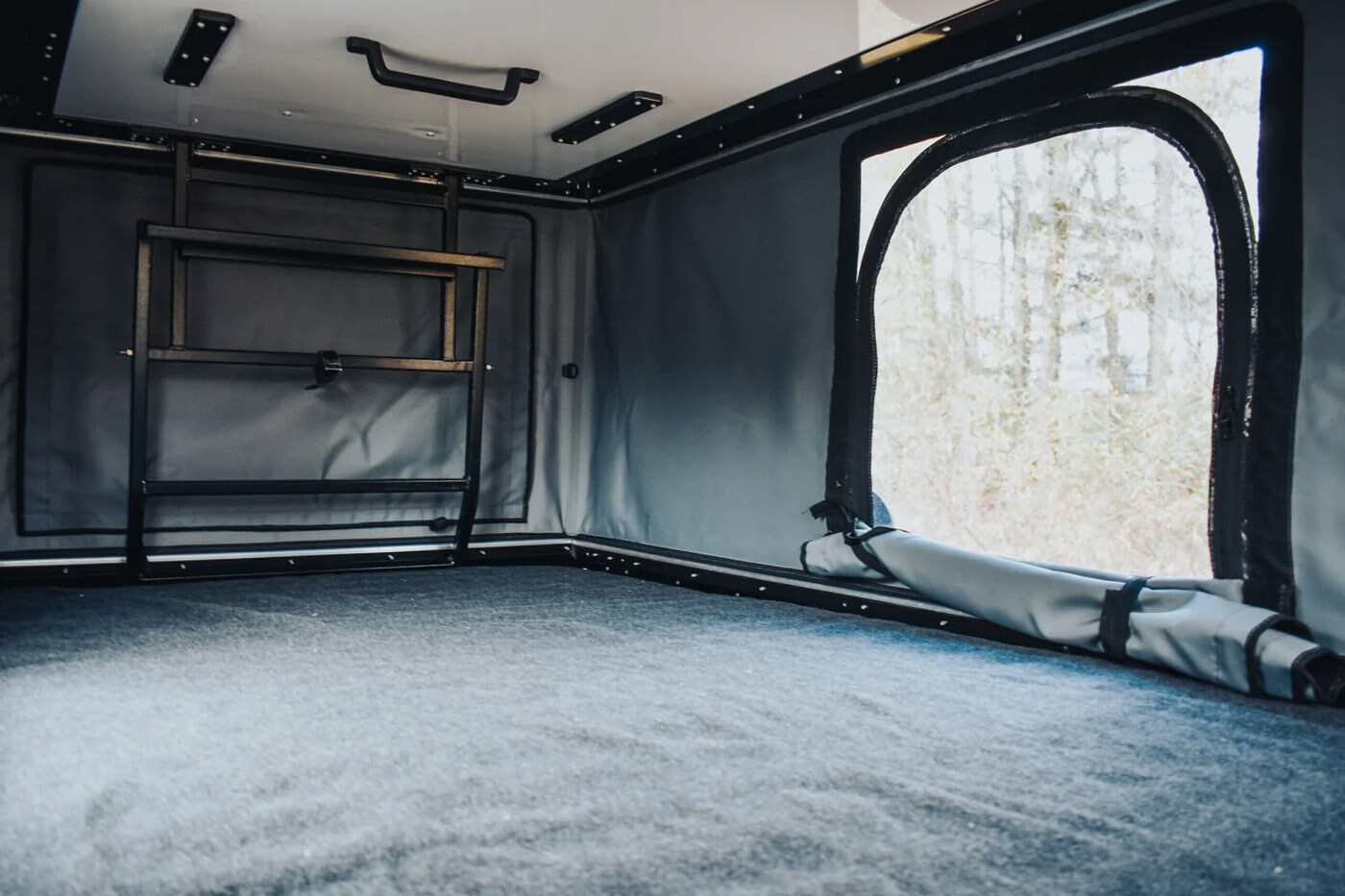 The pop-up roof tent can sleep two people, and you can climb in using an external foldable ladder
