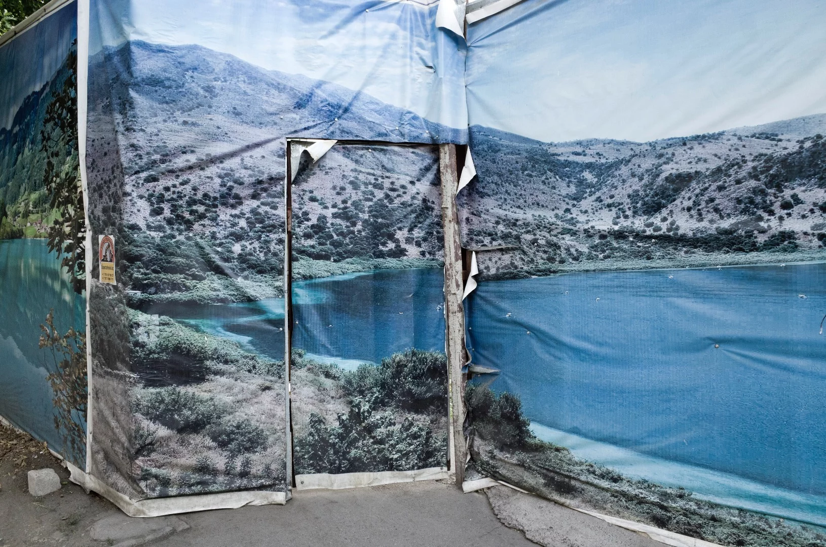 In Almaty, the former capital of the country, many construction areas are decorated with sheets depicting landscapes of Kazakhstan