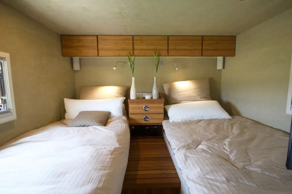 Inside the rear bedroom of the Unicat MD77h expedition vehicle