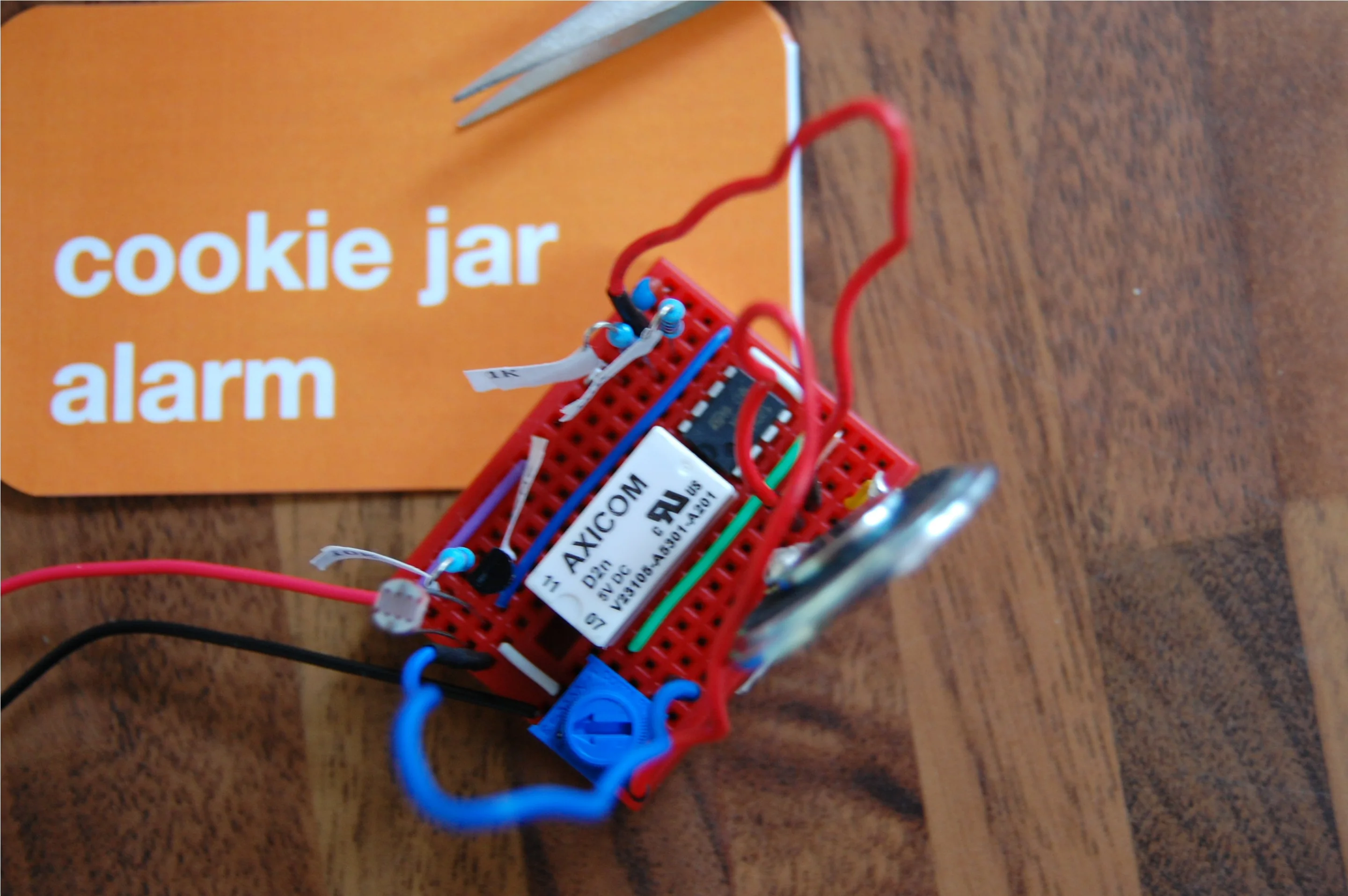 When light hits the light dependant resistor, the speaker sounds to let you know someone trying to steal your cookies