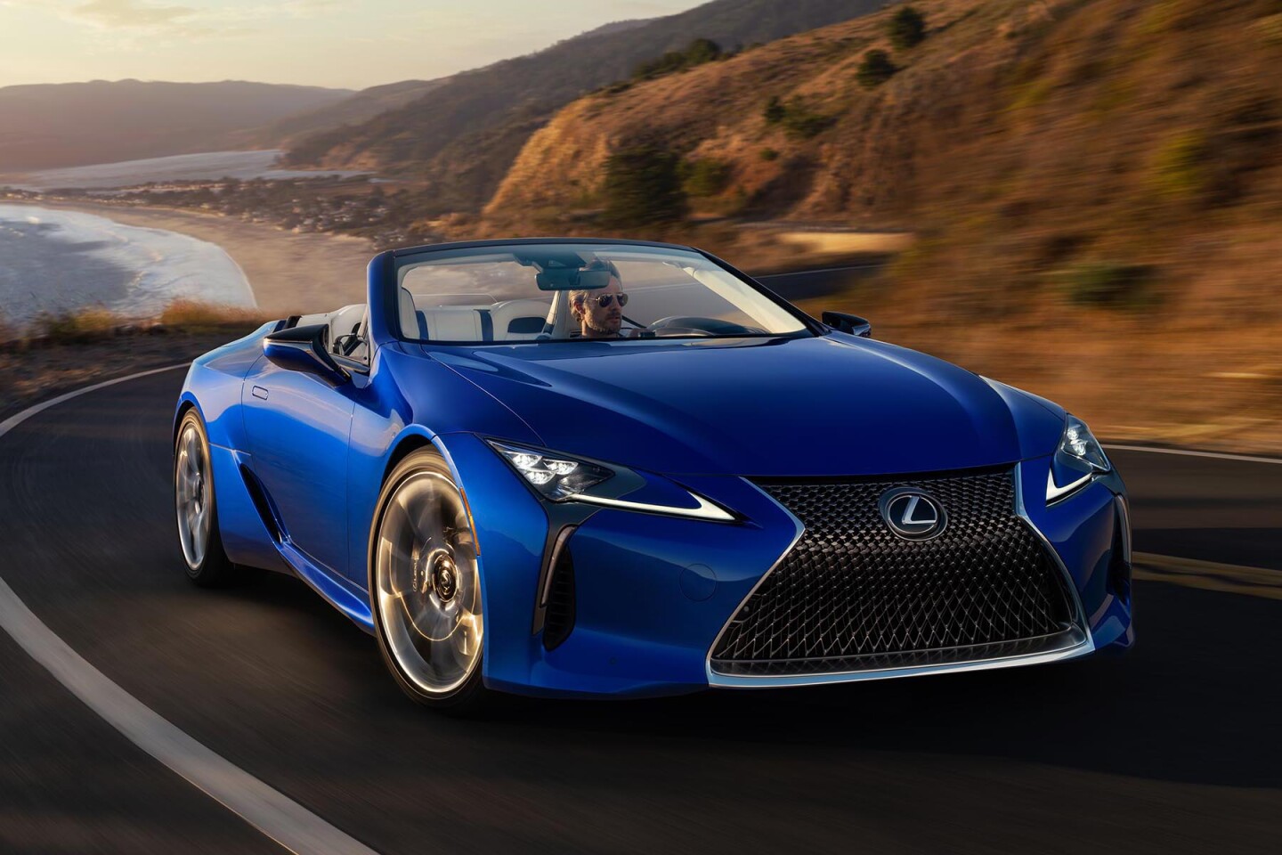 This is the first 2021 Lexus LC 500 Convertible. The car is one of 100 cars customized to be part of the 2021 Lexus LC 500 Convertible Inspiration Series, with special paint, wheels and other component highlights, though the performance will be the same as other 471-hp LC 500s with a Direct-Shift 10-speed automatic transmission. The big difference is that this car bears VIN 100001, and carbon-fiber scuff plates imprinted with “LC Inspiration Series Launch Exclusive 1 of 1.”2