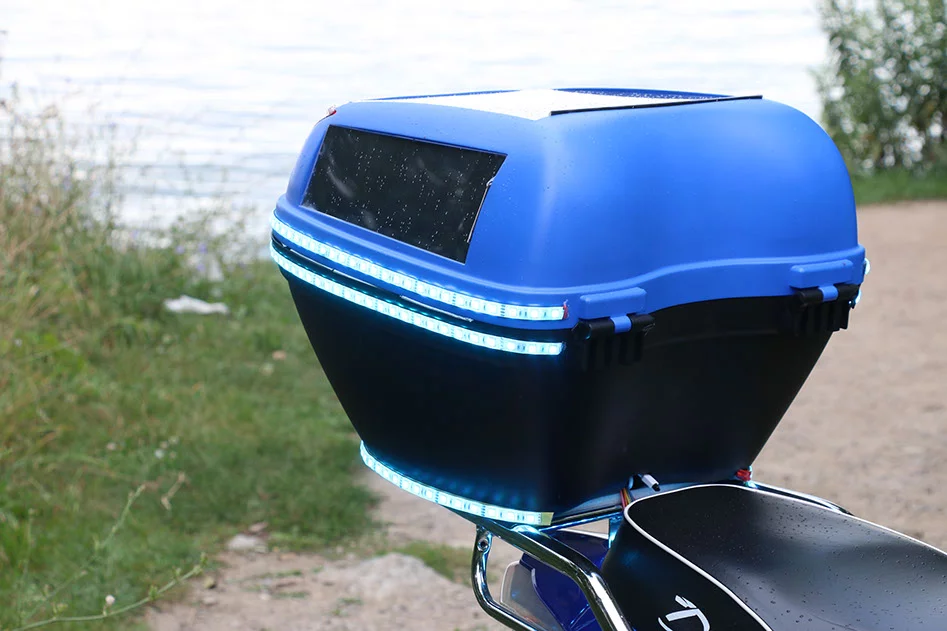 The rear-mounted storage box sports 15 W PV panels and programmable RGB LED light strips