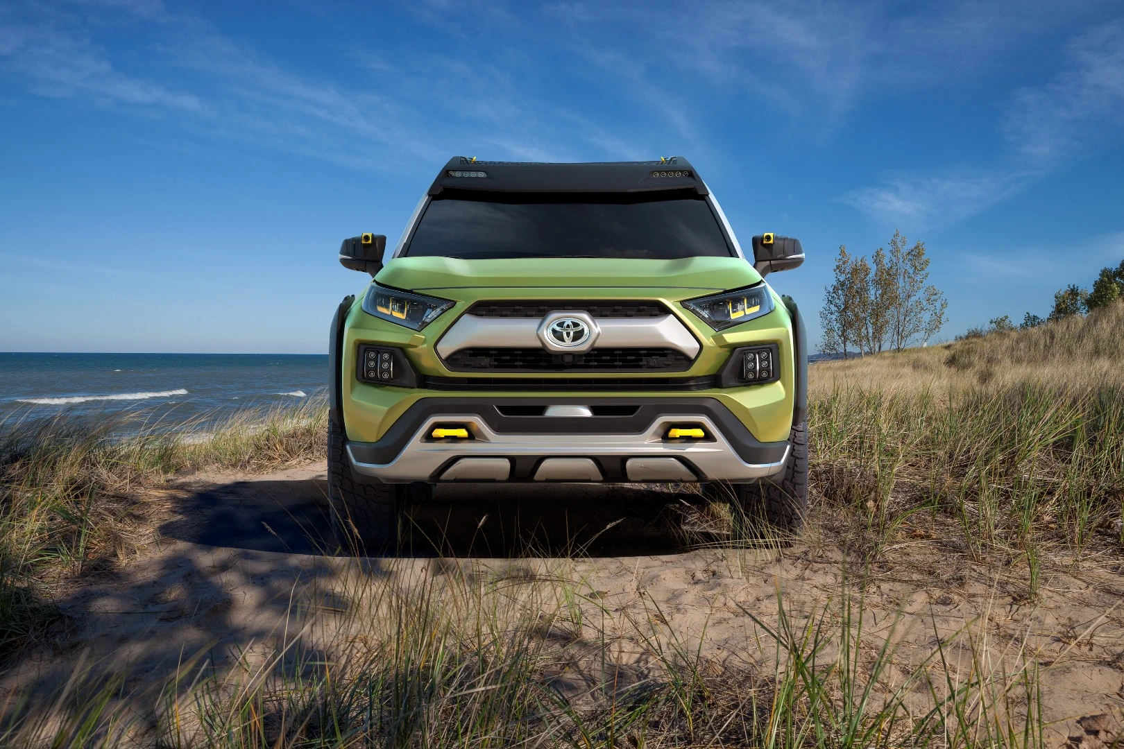 Toyota imagines urban dwellers using the FT-AC to escape outside the city and hike, bike, paddle or climb