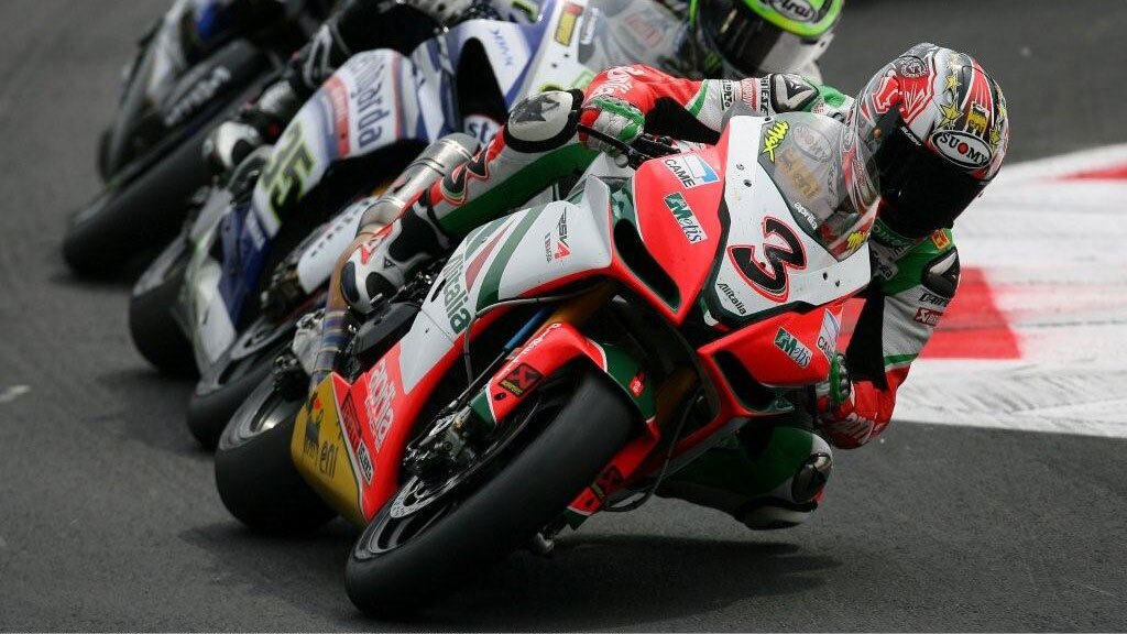 Biaggi's Aprilia RSV4 leads Crutchlow's Yamaha R1 Photo copyright Graeme Brown, GeeBee Images