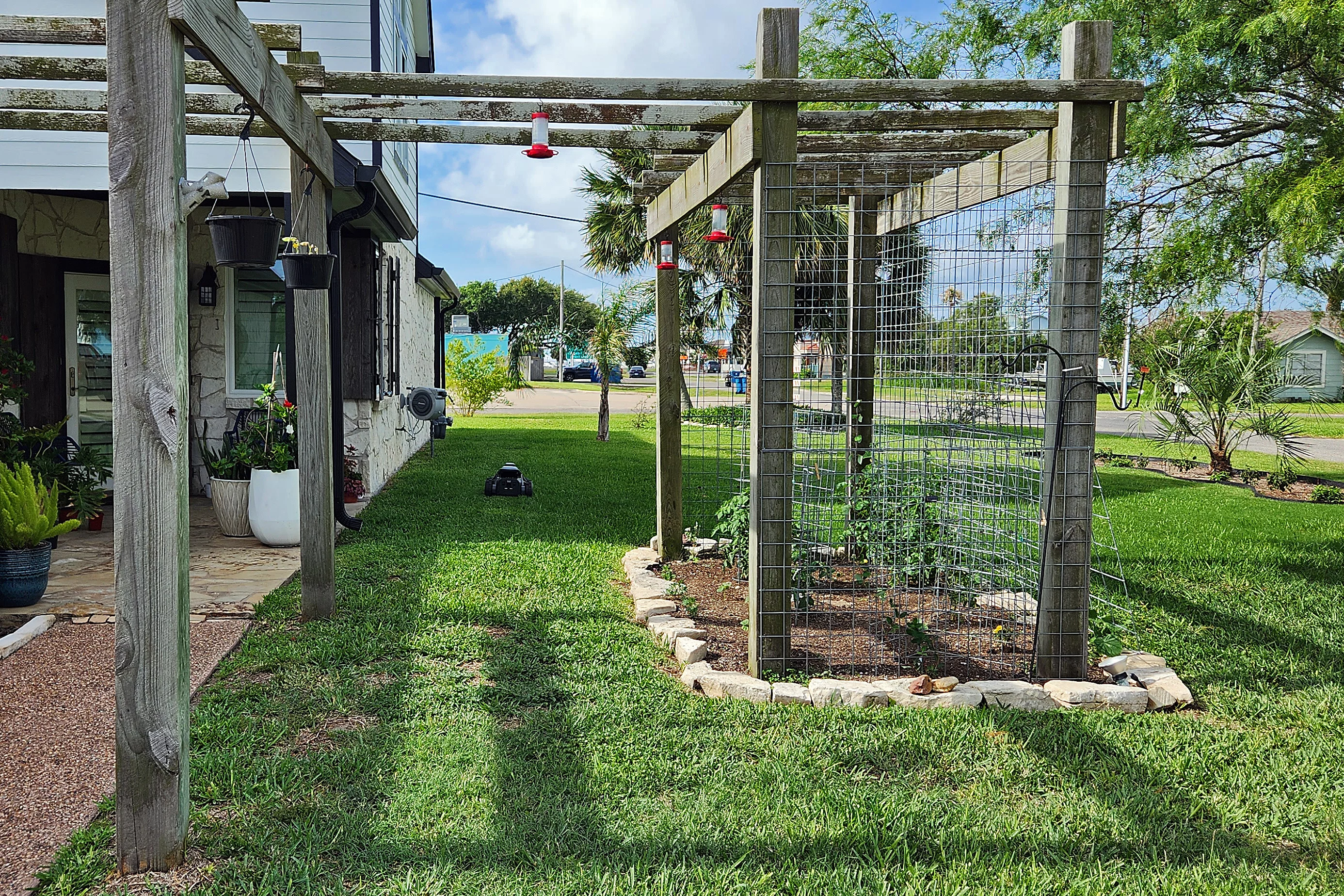 Narrow spaces is where the Tron struggles. This is just about as tight as I could get it to mow, especially considering that vegetable garden on the right had to me marked as a no-go zone, else the Tron would try to scale the walls.