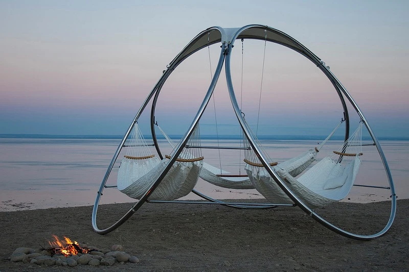 The modern-looking Infinity works beautifully on a beach as the sun goes down
