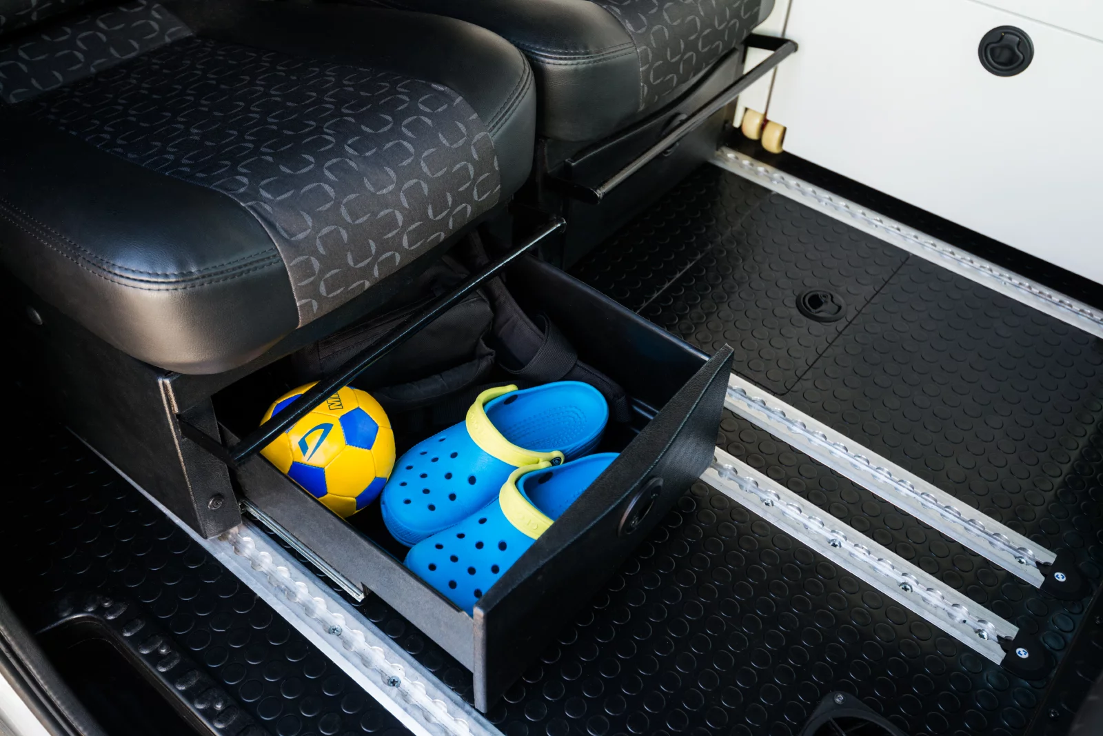 Under-seat drawers are available optionally