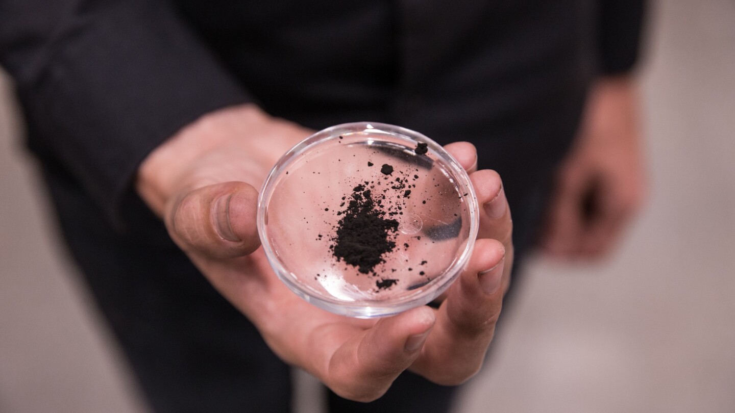Particles captured by the Smog Free Tower are collected and compressed into cubes for jewelry