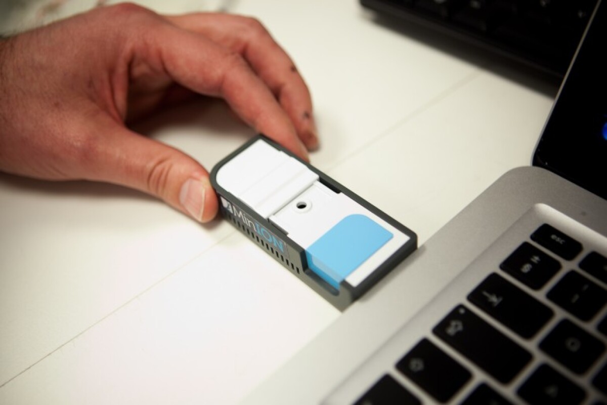 The MinION is the size of a USB memory stick, and obtains both power and computer analysis from a normal laptop computer (Image: Oxford Nanopore)