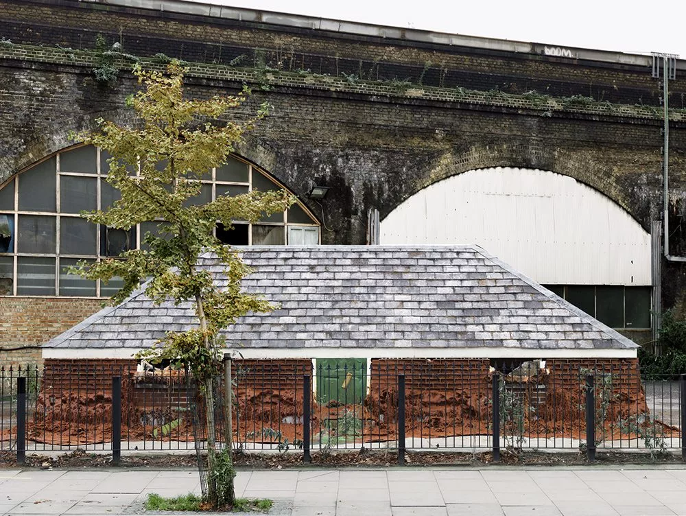A pound of flesh for 50p displayed a slowly melting house, made out of wax bricks, disappearing over two months