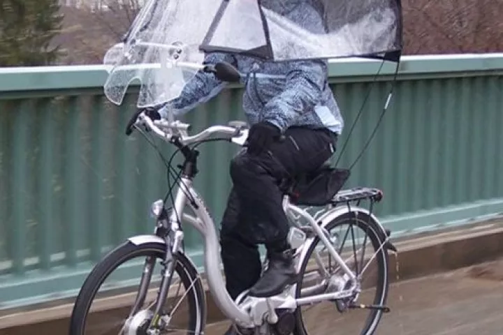 The Veltop is a removable windscreen/canopy/side window system, for protecting cyclists from rain and cold winds