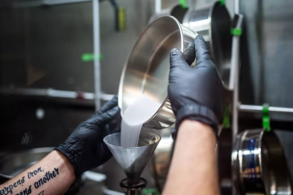 Raw materials are put separately into the Laser Engineered Net Shaping additive manufacture machine