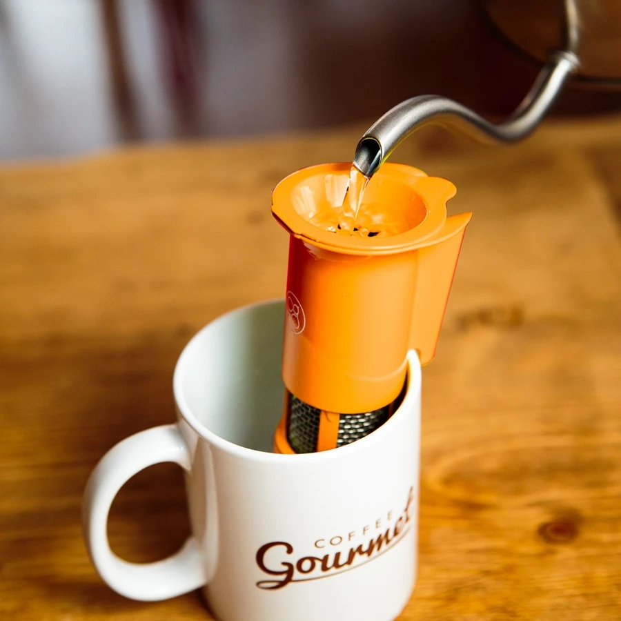 The Coffee Gourmet uses a constant flow of near-boiling water to help the coffee grinds bloom and push the liquid through the filter (Photo: TS Design)