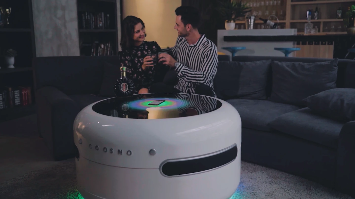 As users' songs play, a pulsating 160,000-color 288-LED display in Coosno's tempered glass tabletop visualizes the music