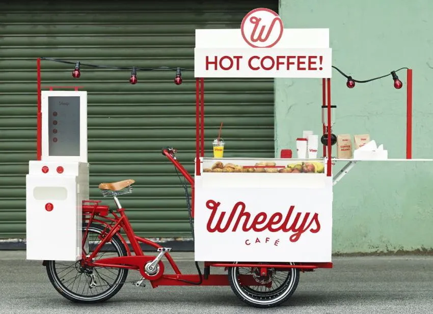 Power is provided by an onboard battery pack, which also runs the trike's electric-assist motor