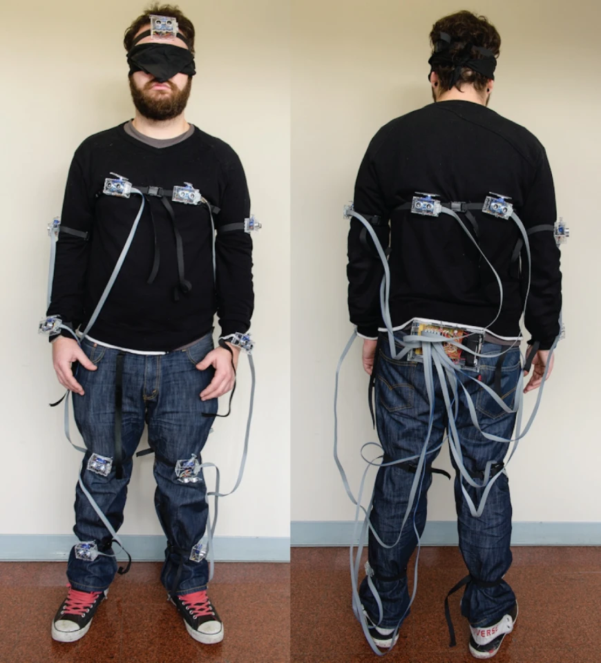 SpiderSense consists of thirteen sensor modules placed on various parts of the body - arms, legs, chest, back, forehead, etc. - and connected to a controller box