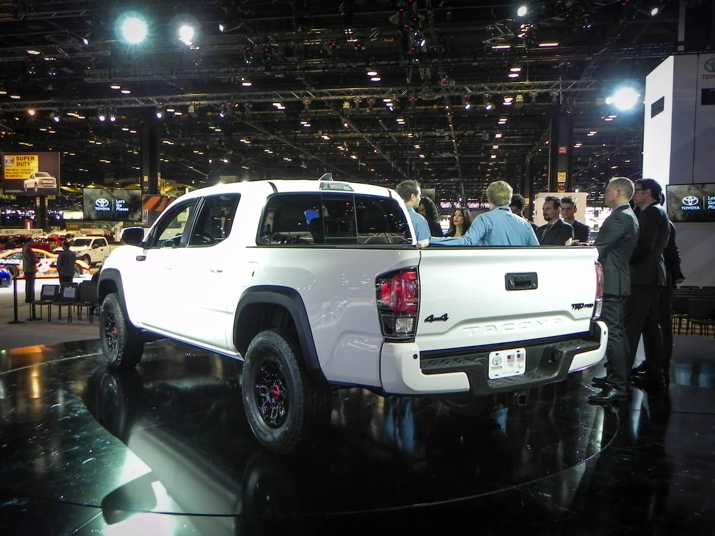 A crowd of Toyota employees looks at the Tacoma TRD Pro on display at the Chicago Auto Show, where it debuted