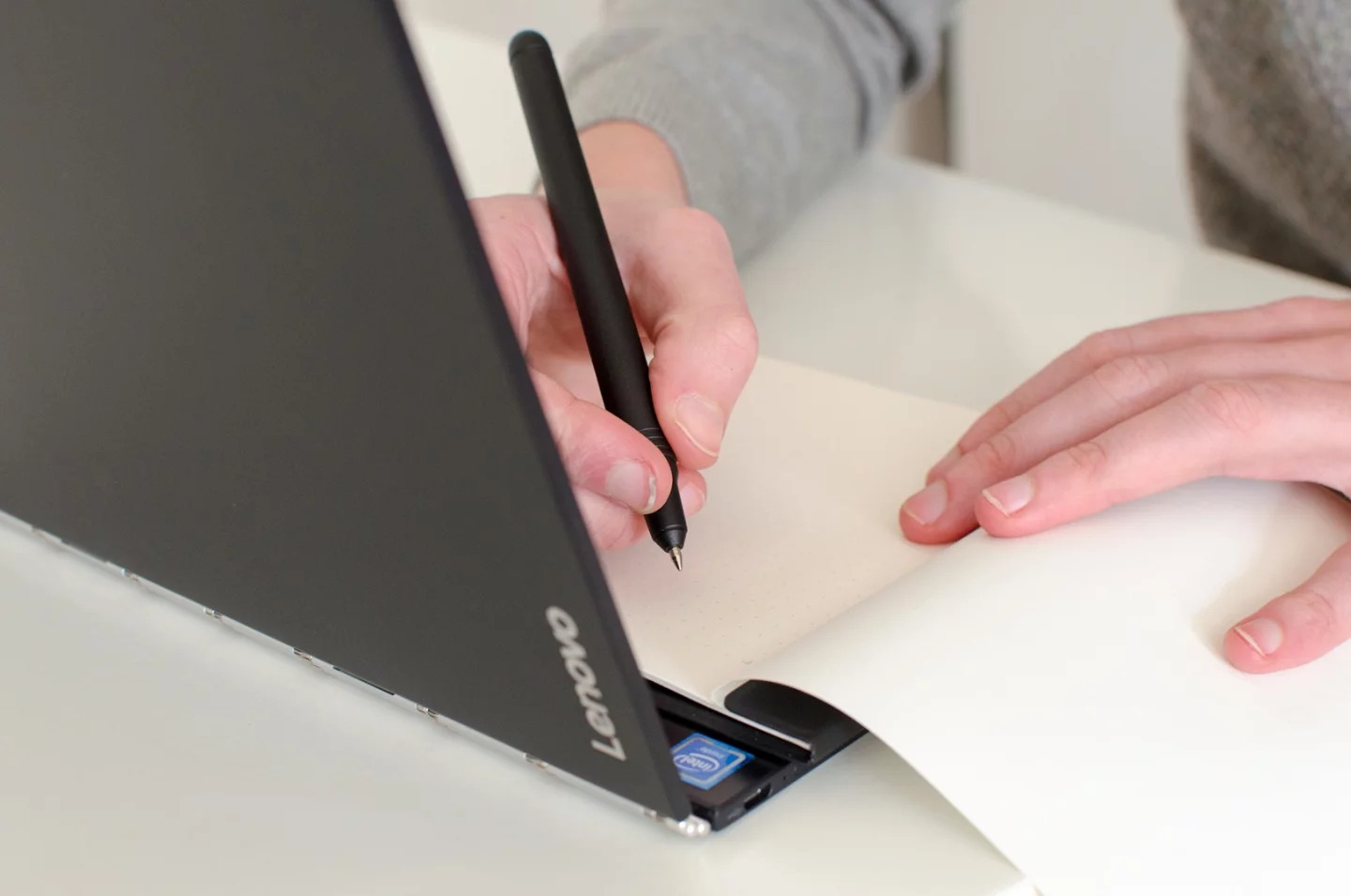 Fitted with a ballpoint nib, Yoga Book's stylus lets you write on paper while your notes show up onscreen