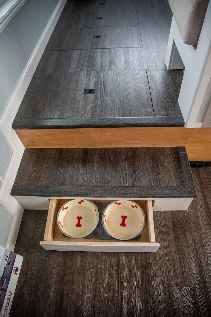 This step inside the Revolve House can be pulled back to reveal a storage space