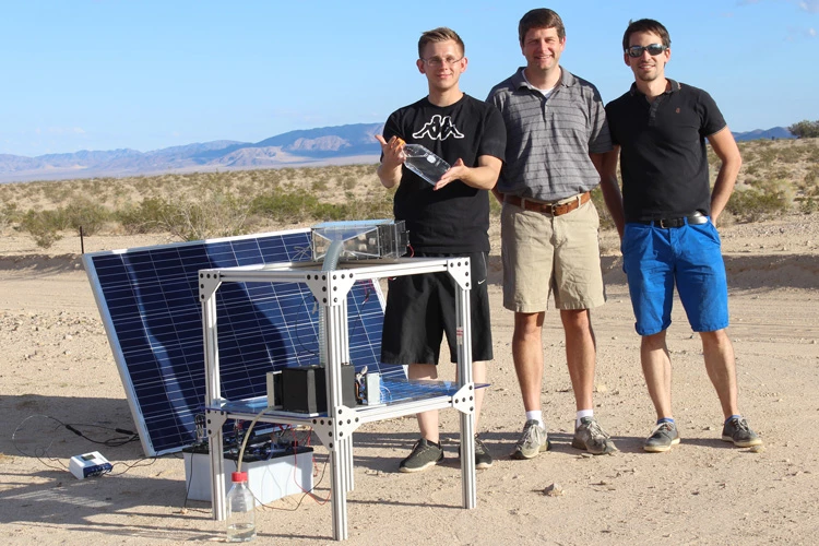 From left, researchers Nikita Hanikel, Grant Glover and Mathieu Prévot, with the water harvester