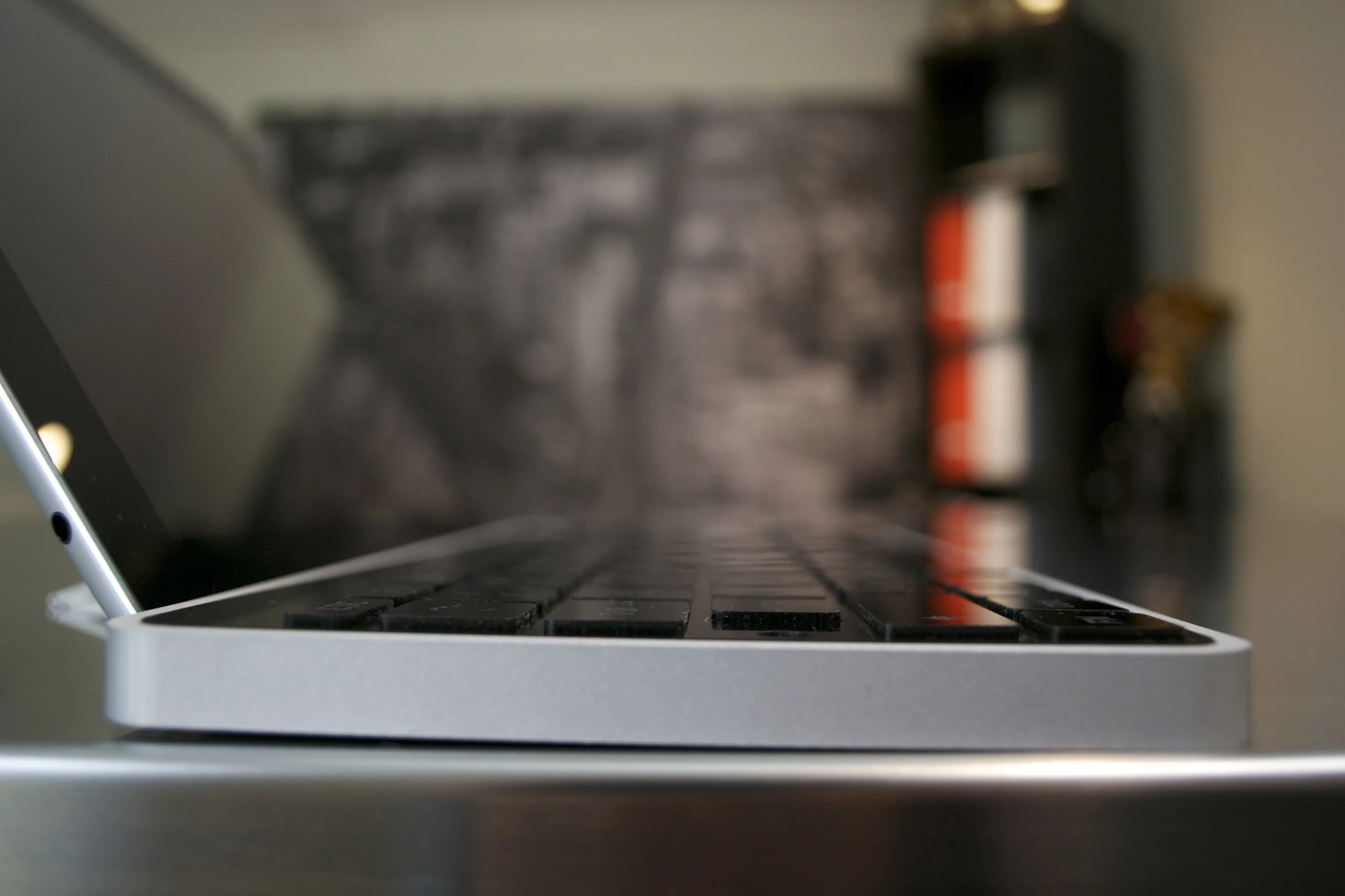 To protect the keys during transit and to add a wow factor to a somewhat boring peripheral, the keys elevate from within the body of the keyboard when activated by pressing a mechanical button to the left