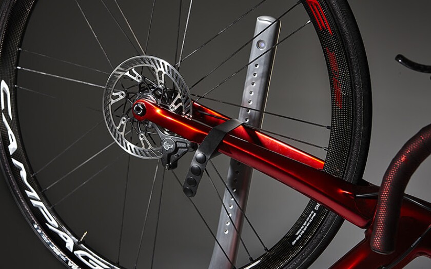 The Vertik's support rod can be height adjusted to accommodate bikes of different sizes