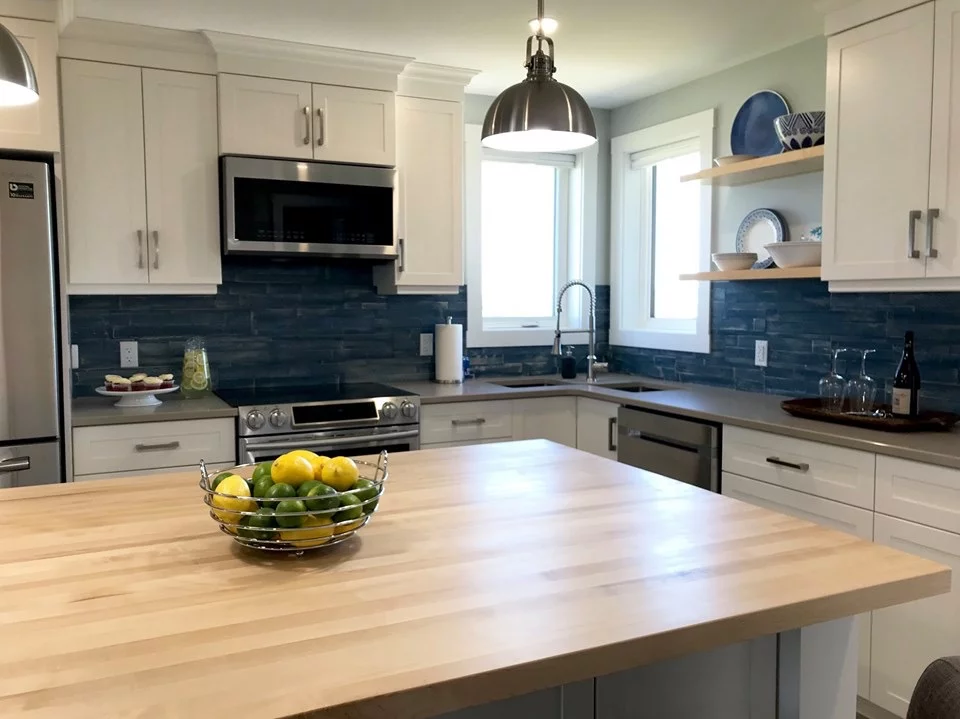 Beach House features a large modern kitchen and open living room