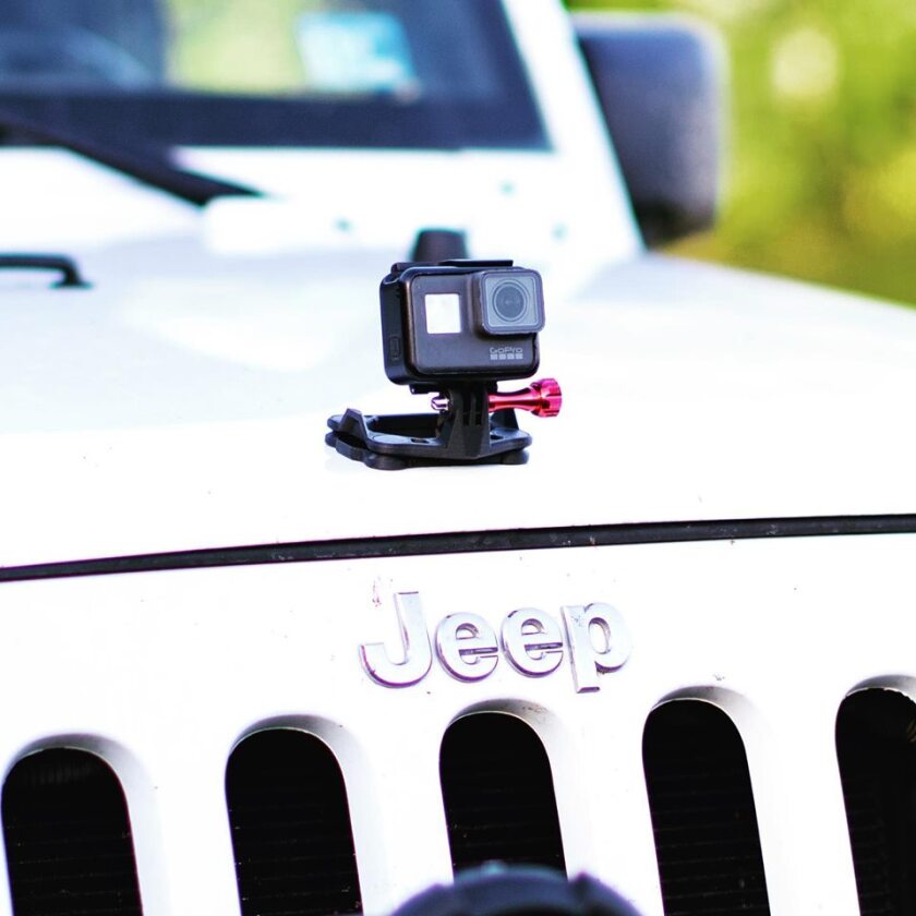 A Snap Mount-equipped GoPro, fastened to a Jeep