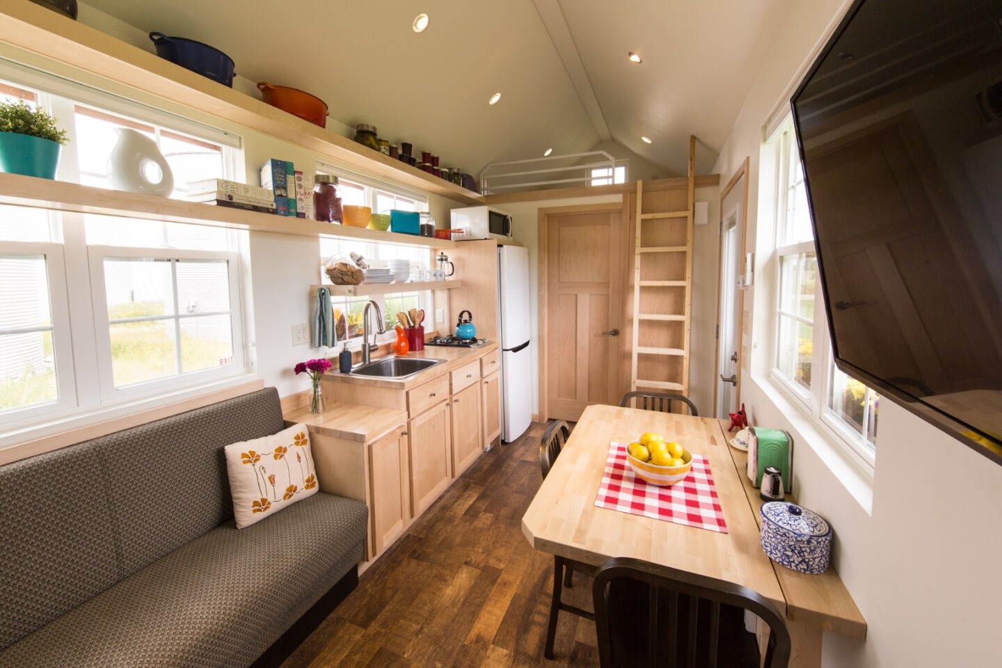 The main living space, with kitchen, dining area, and lounge area